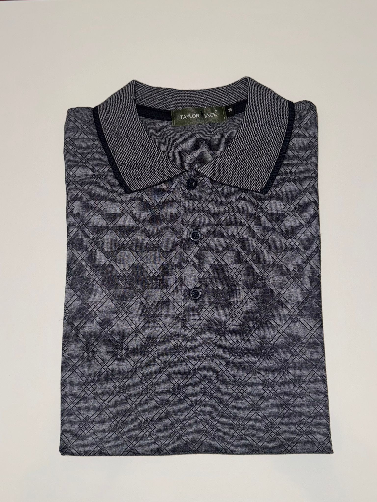 Grijze polo met subtiel patroon