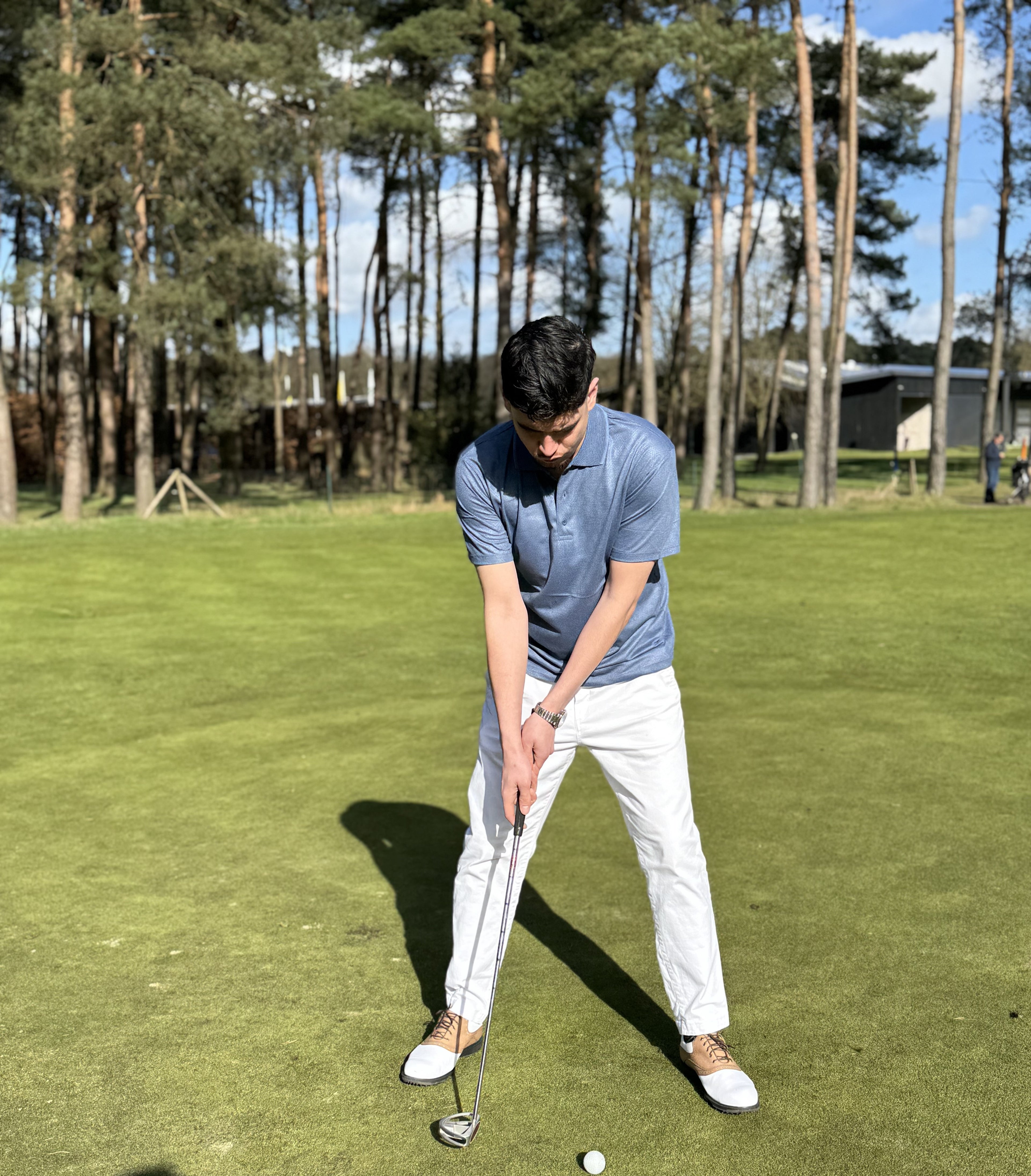 Lichtblauw polo met subtiel patroon